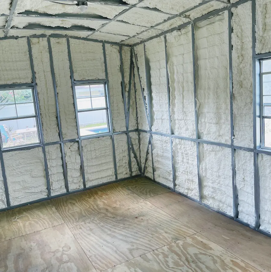 Closed-cell spray foam insulation applied to wall cavities in a residential project in Fairfield Glade